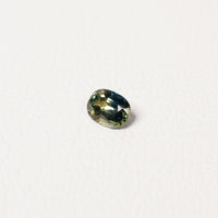 Australian Blue 0.8CT Oval cut sapphire hand view — Ruhuna Gemstones