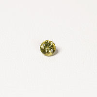 0.95ct Australian yellow-green sapphire round brilliant — vivid lime yellow-green, face-up view — Ruhuna Gemstones