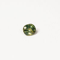 1.70ct Australian parti sapphire cushion — yellow-green centre with forest green crown, face-up — Ruhuna Gemstones