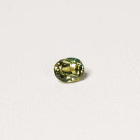 Australian Teal 1.55CT Oval cut sapphire hand view — Ruhuna Gemstones