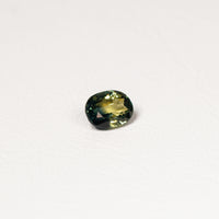 Australian Teal 1.45CT Oval cut sapphire hand view — Ruhuna Gemstones