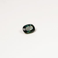 Australian Teal 1.15CT Oval cut sapphire hand view — Ruhuna Gemstones