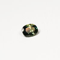 Australian Teal 1.95CT Oval cut sapphire hand view — Ruhuna Gemstones