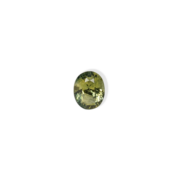 1 carat pear parti teal sapphire with mixed green and yellow color.