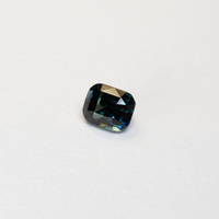 2.64 carat cushion cut teal parti sapphire with blue and green