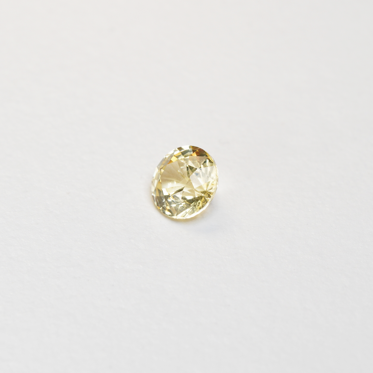 1.56 carat round cut yellow ceylon sapphire