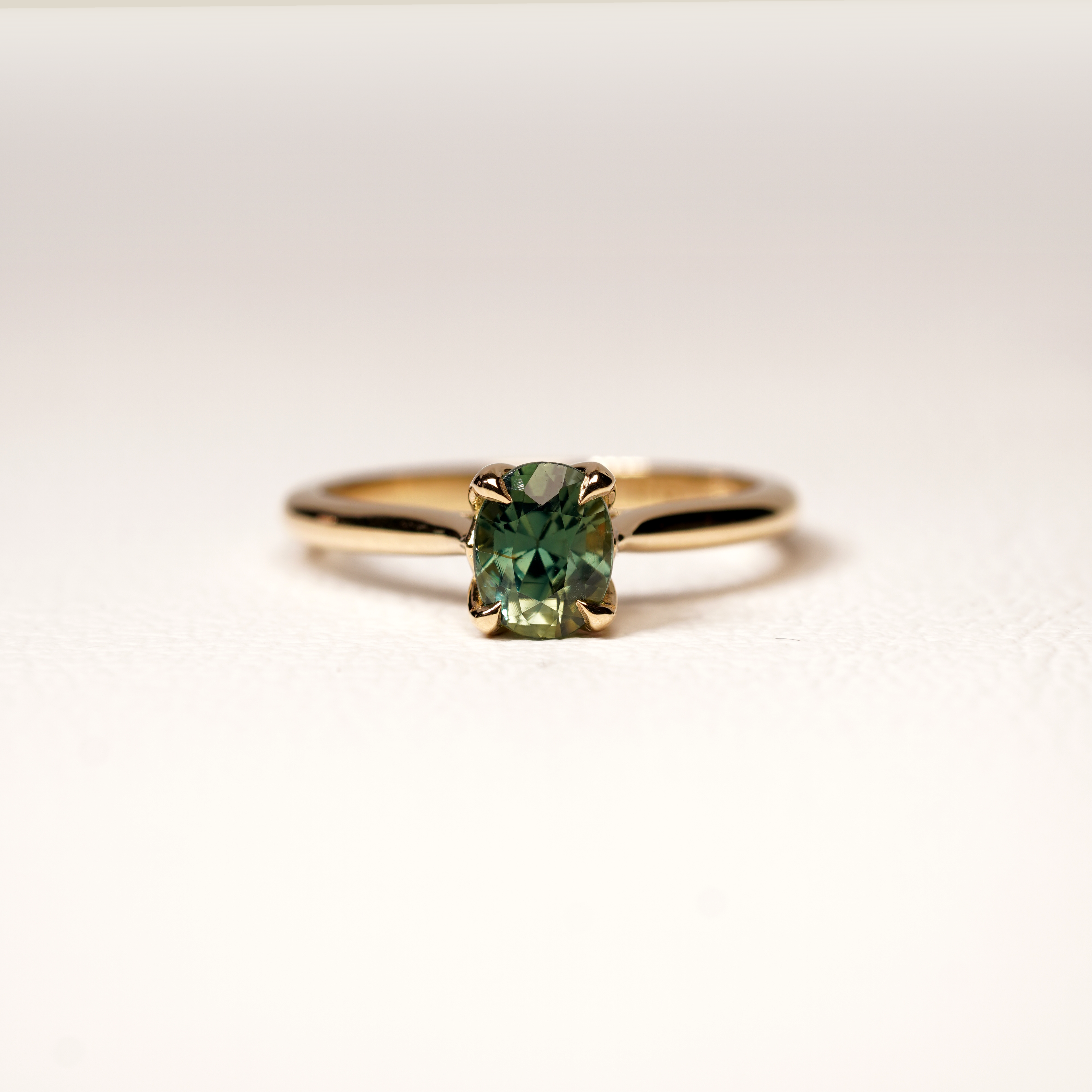PARTI GREEN SAPPHIRE SOLITAIRE RING SET IN YELLOW GOLD