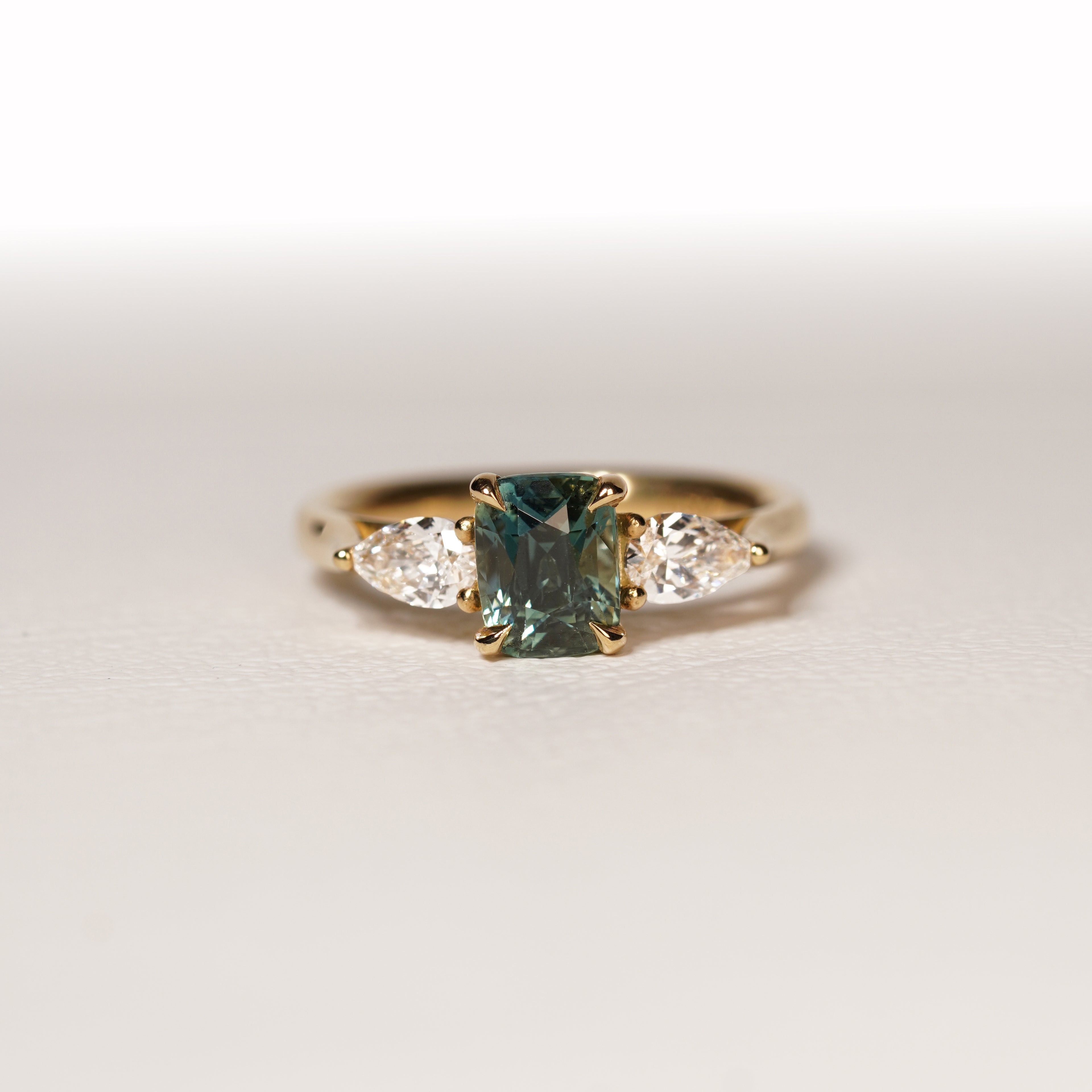 ELLA 1.55CT TEAL SAPPHIRE TRILOGY RING
