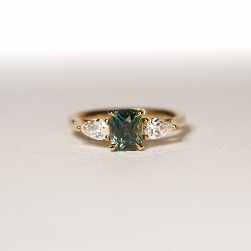 ELLA 1.55CT TEAL SAPPHIRE TRILOGY RING
