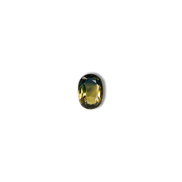0.90ct Australian parti sapphire oval — golden yellow and teal-green colour zones, face-up — Ruhuna Gemstones