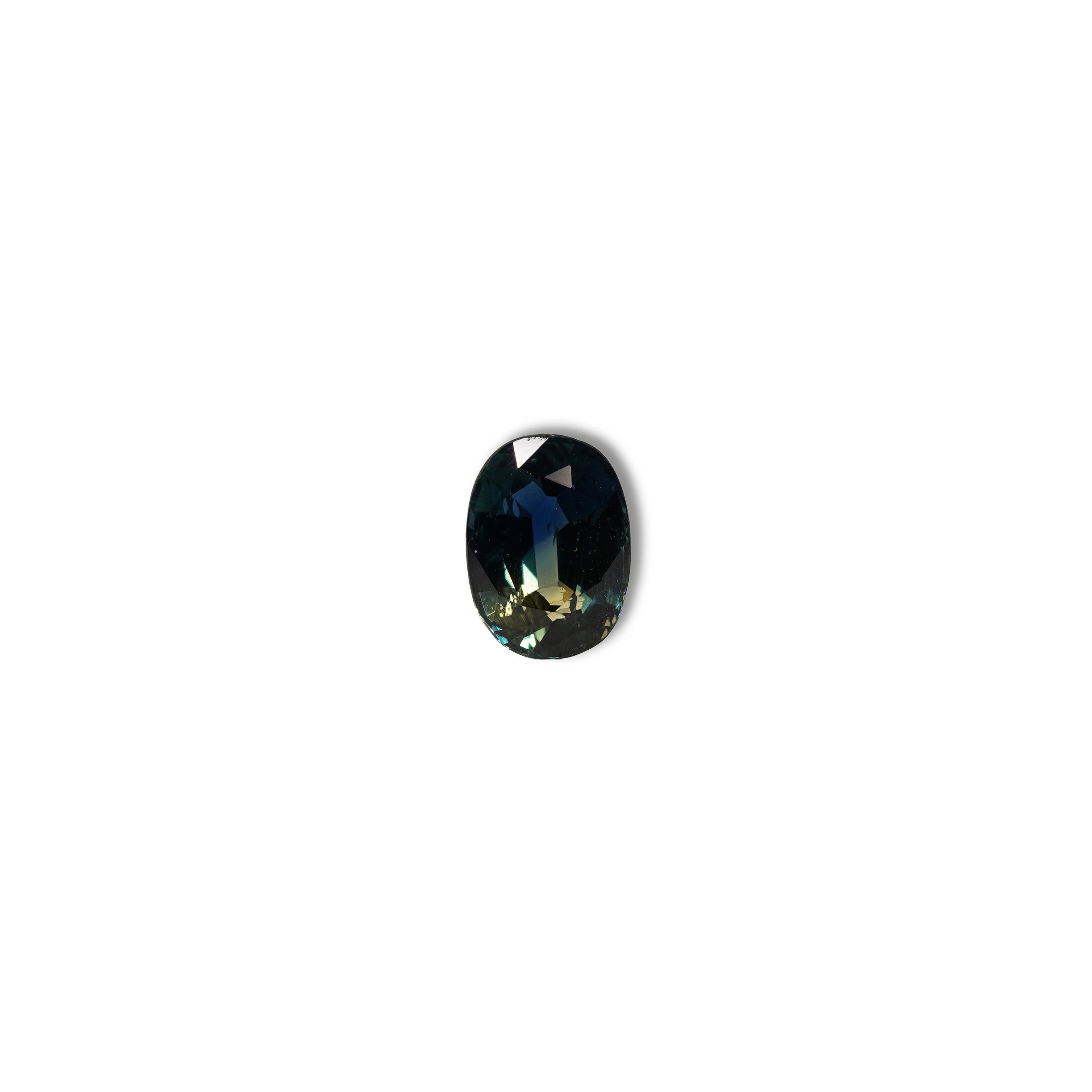  1.25ct Australian parti sapphire oval — deep teal with copper flash through table, face-up — Ruhuna Gemstones