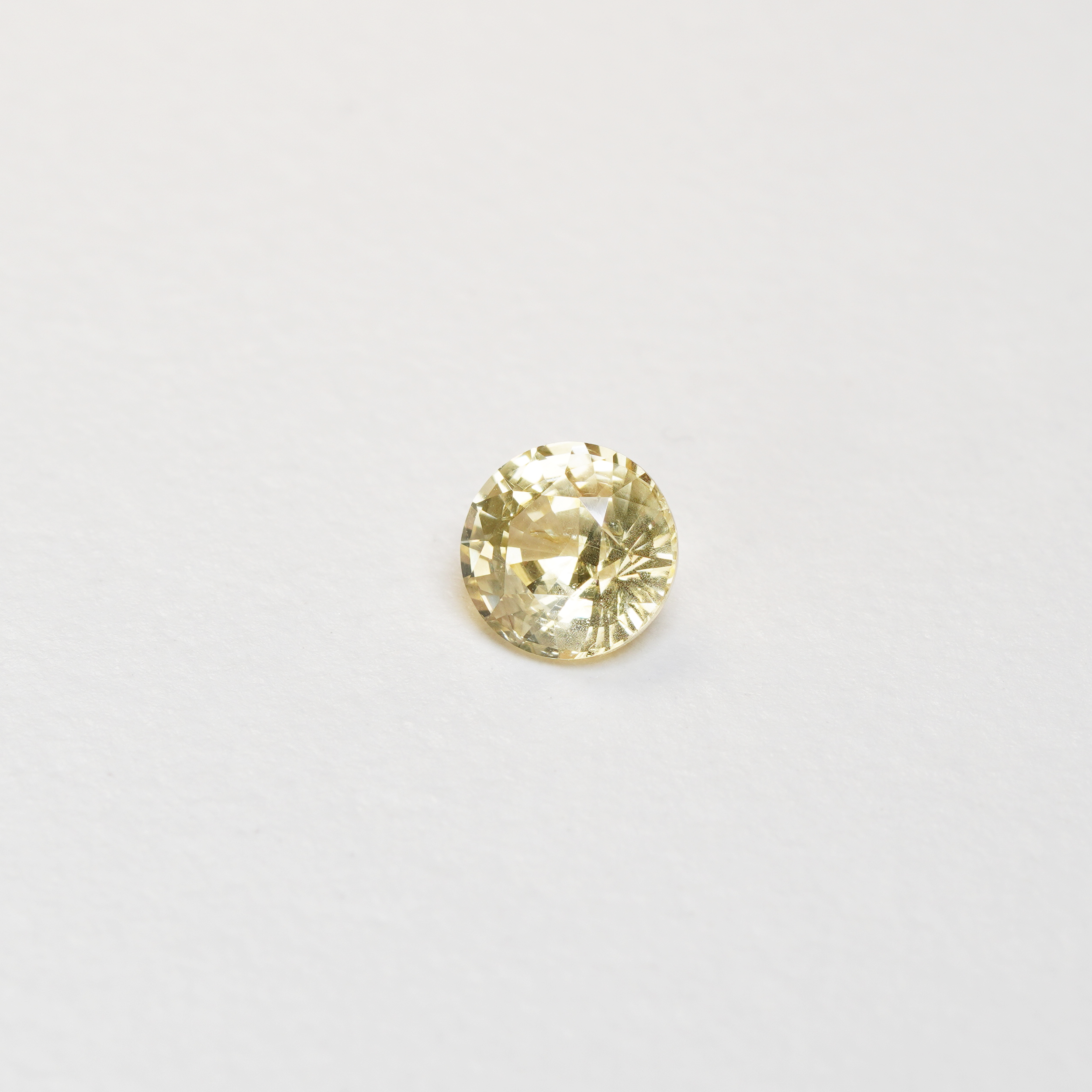 1.56 carat round cut yellow ceylon sapphire