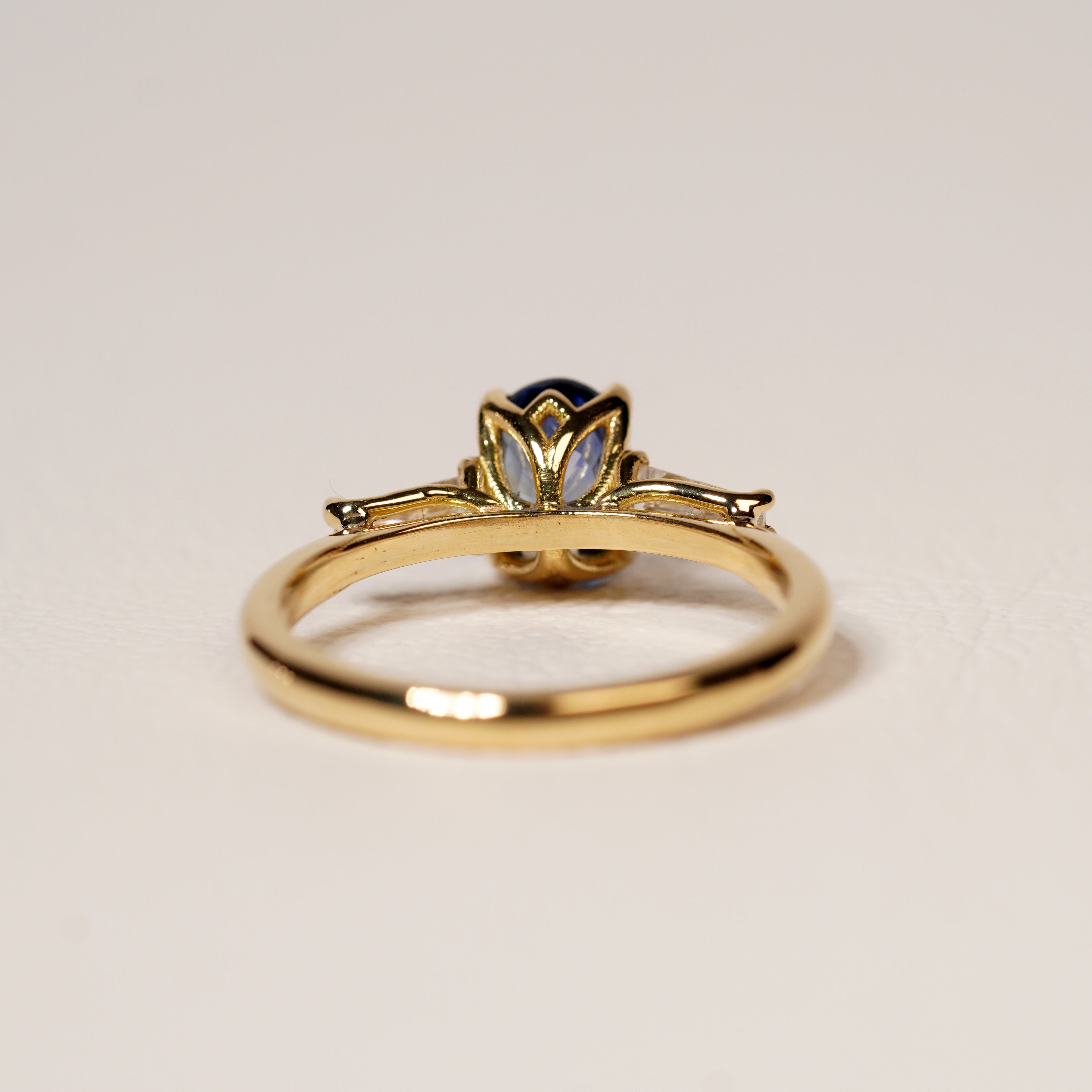 Blue sapphire and diamond engagement ring