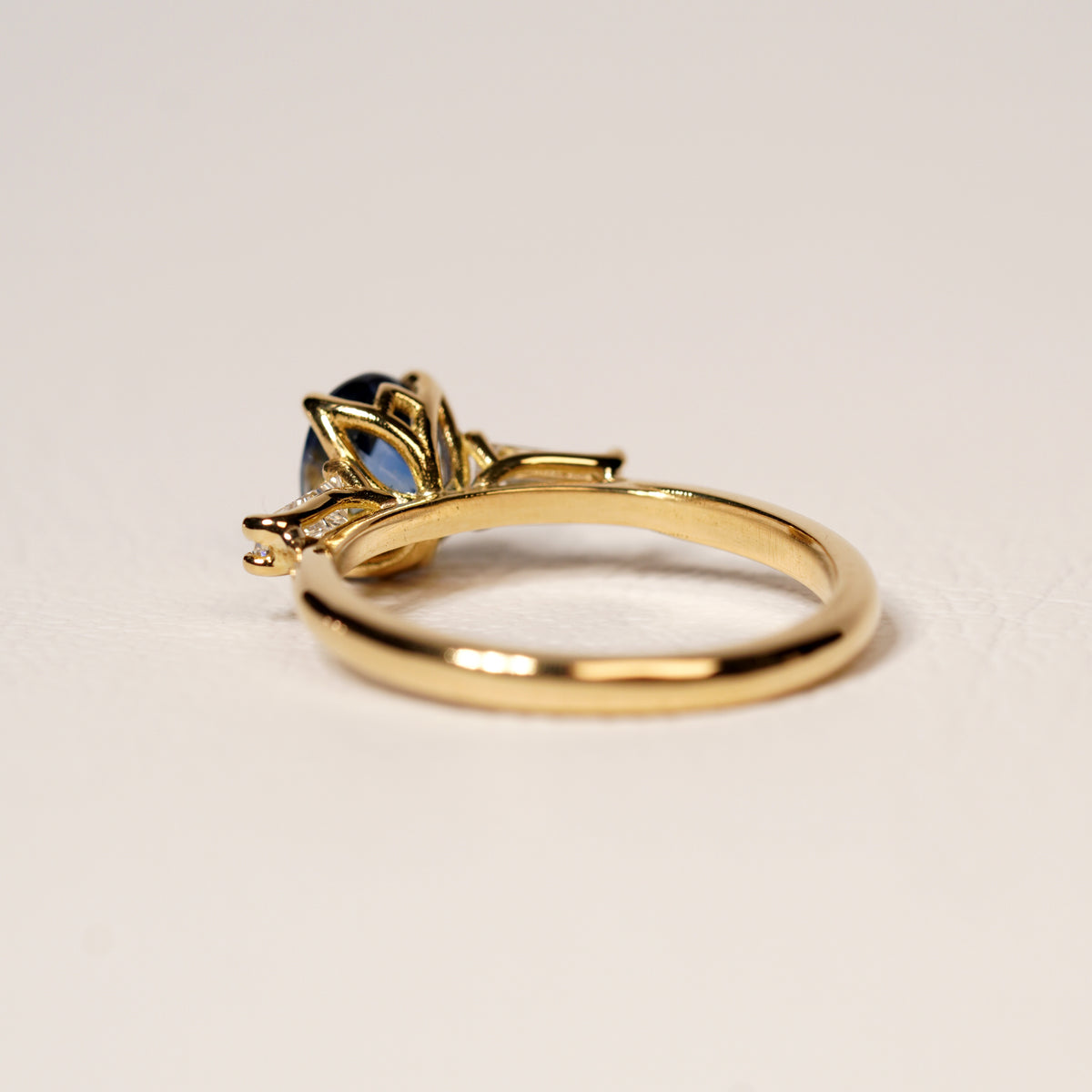 Blue sapphire and diamond engagement ring