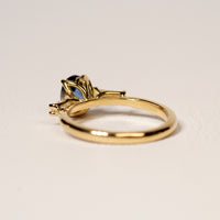 Blue sapphire and diamond engagement ring