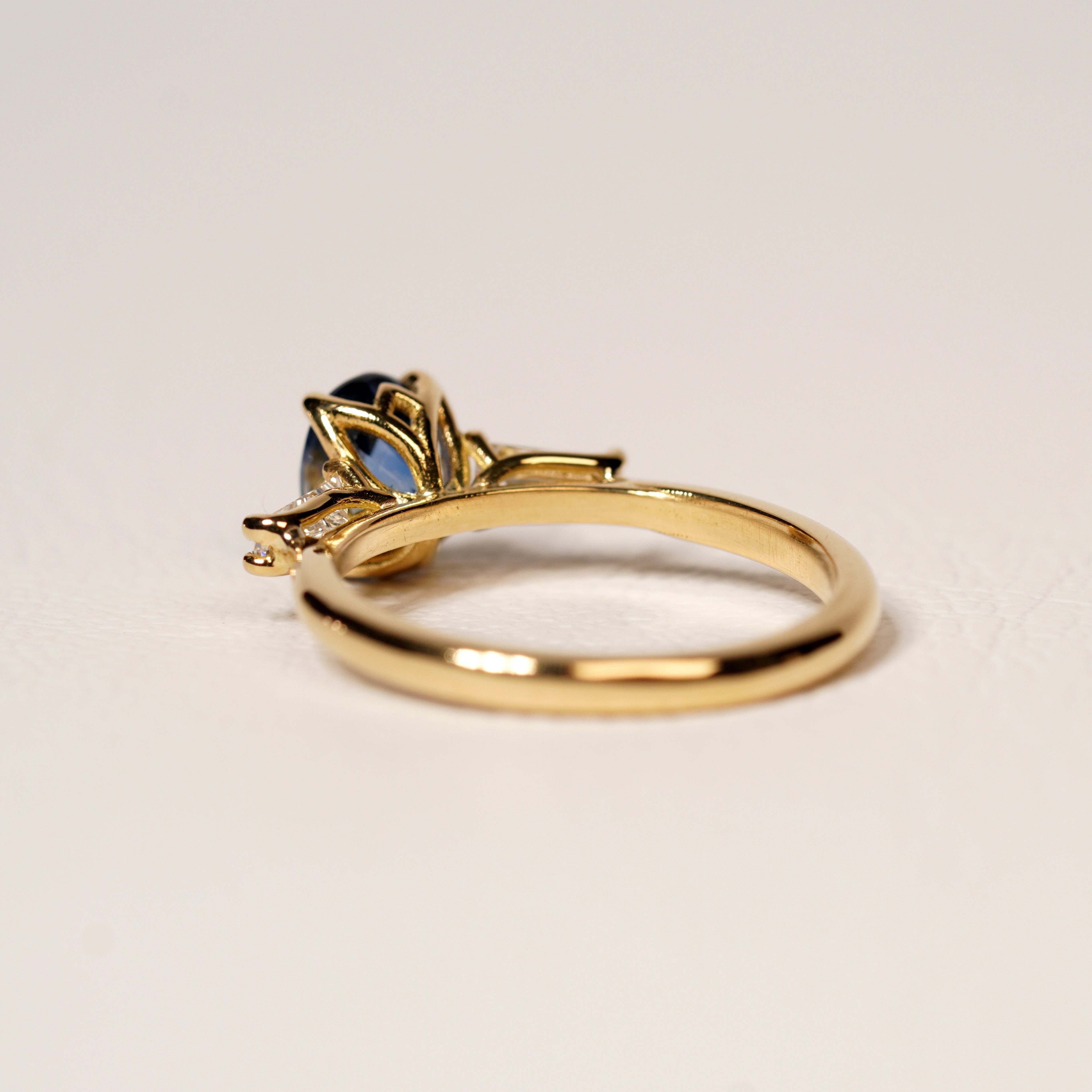 Blue sapphire and diamond engagement ring