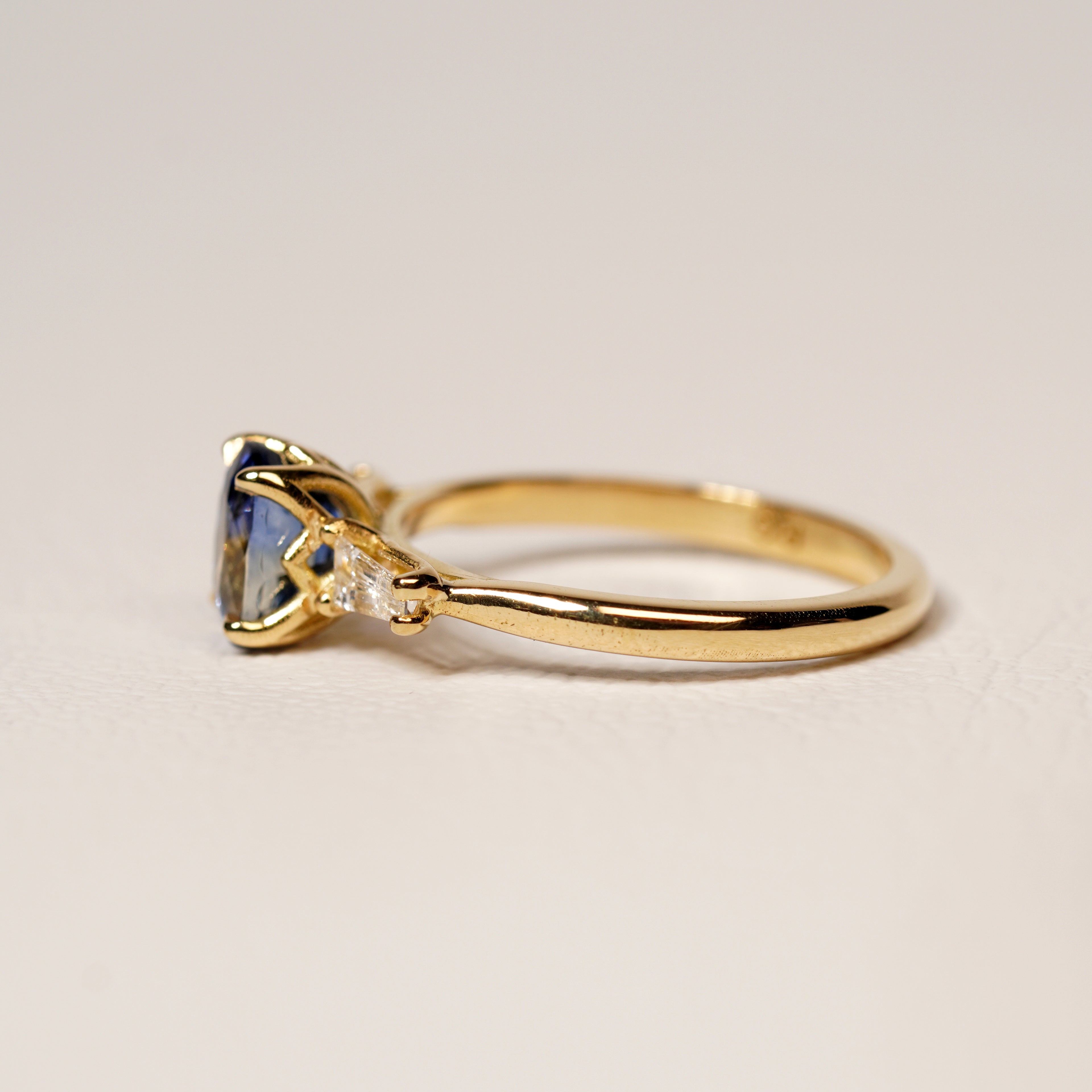 Blue sapphire and diamond engagement ring