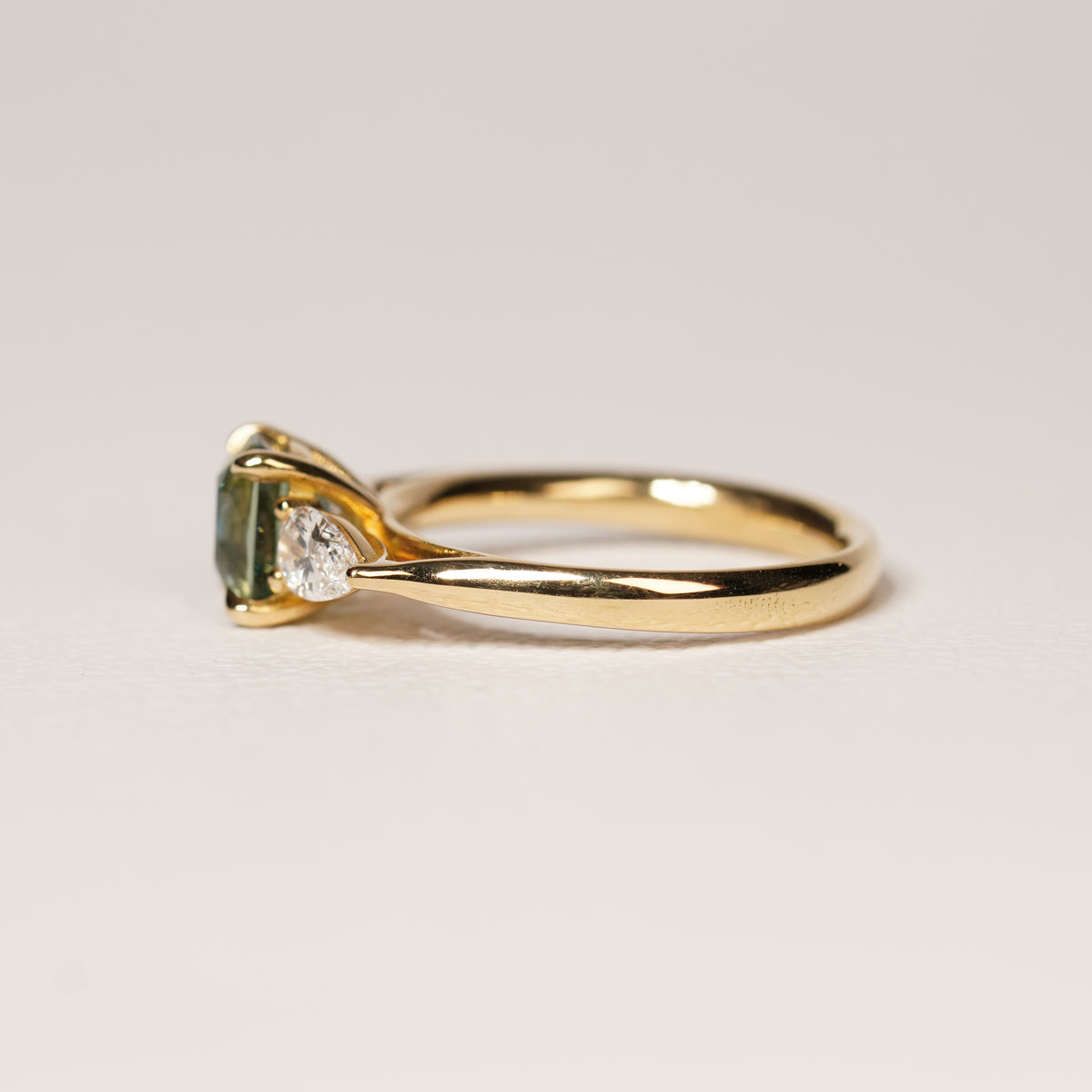Madagascar 1.55CT Ella 1.55Ct Teal Sapphire Trilogy Ring engagement ring alternative angle — Ruhuna Gemstones