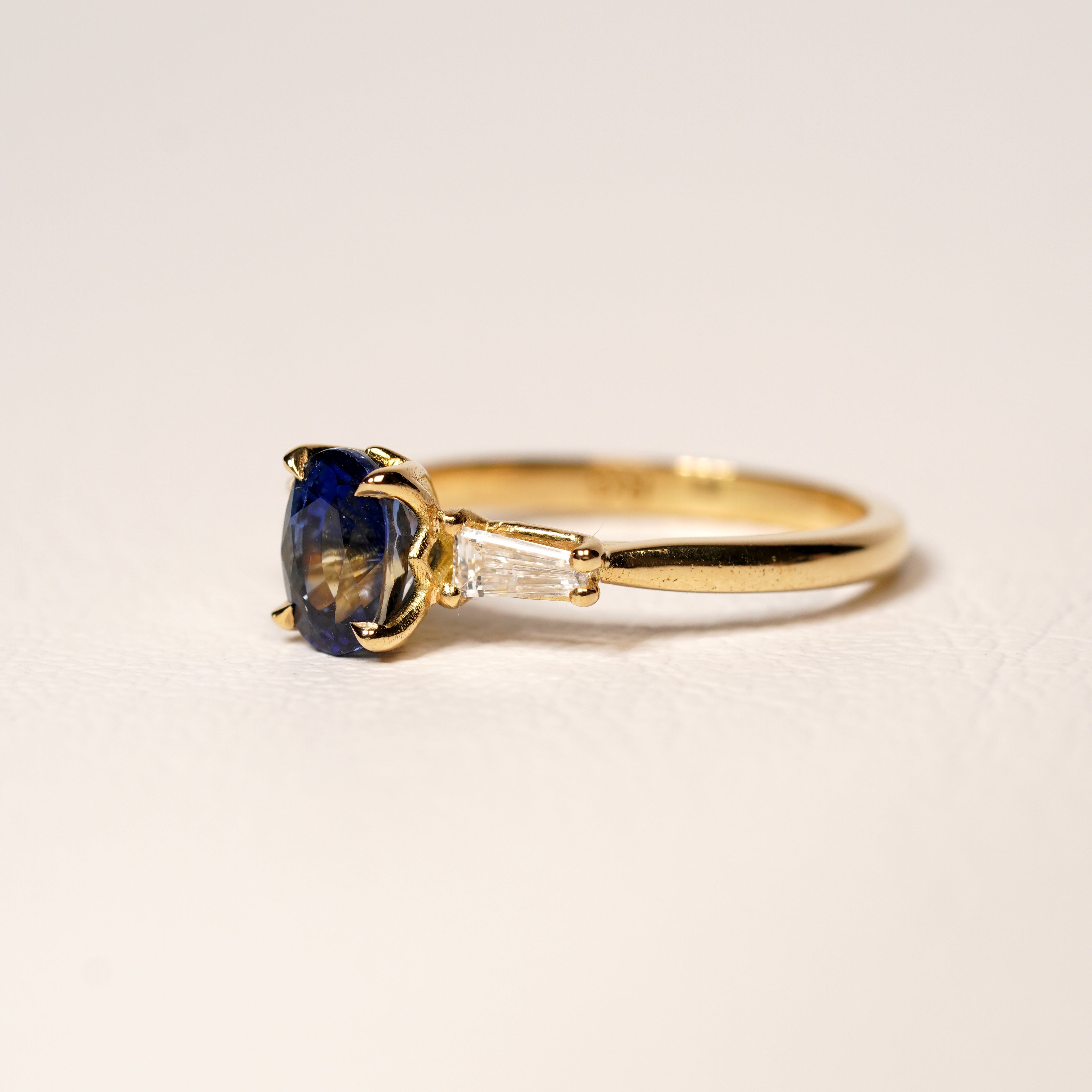 Blue sapphire and diamond engagement ring