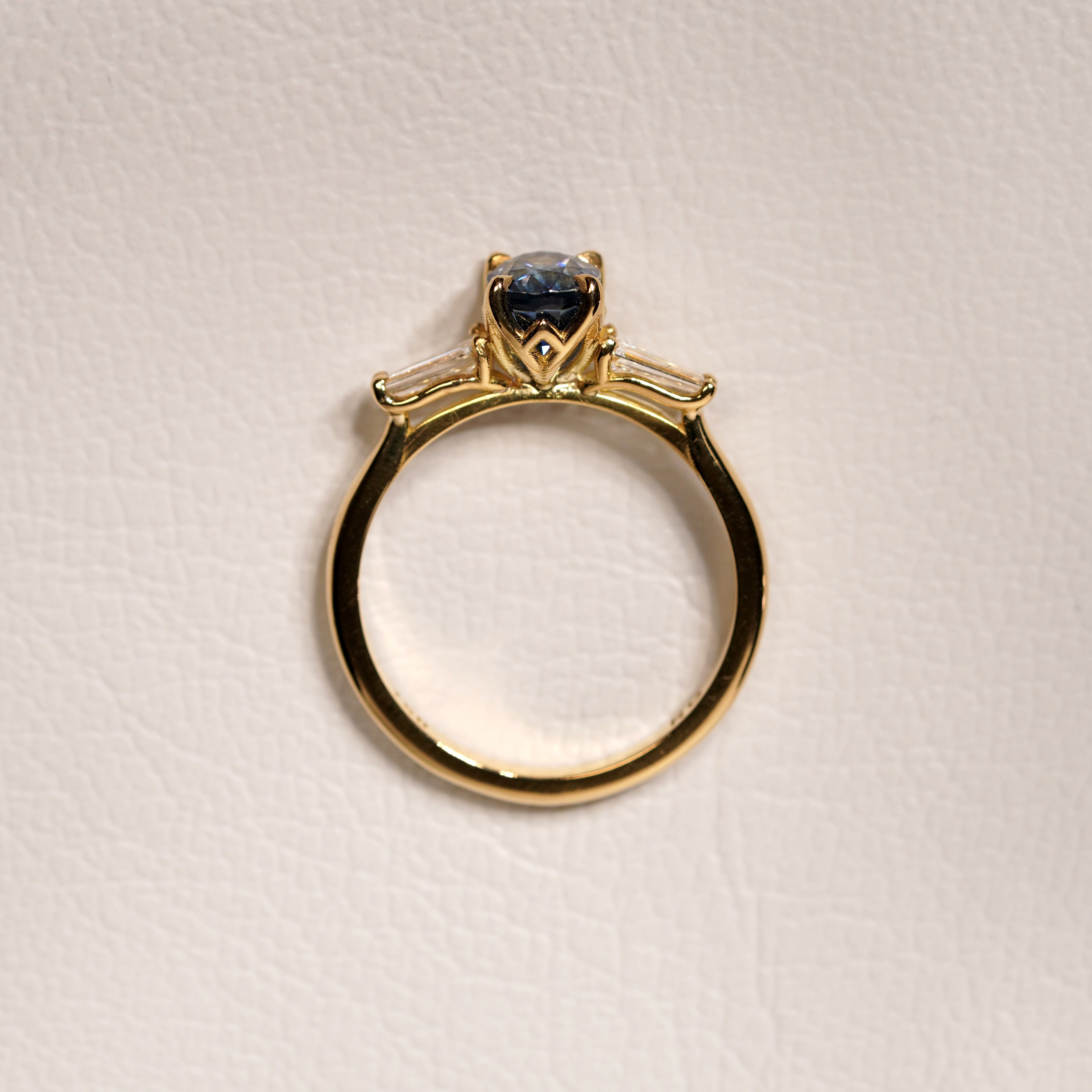 Blue sapphire and diamond engagement ring