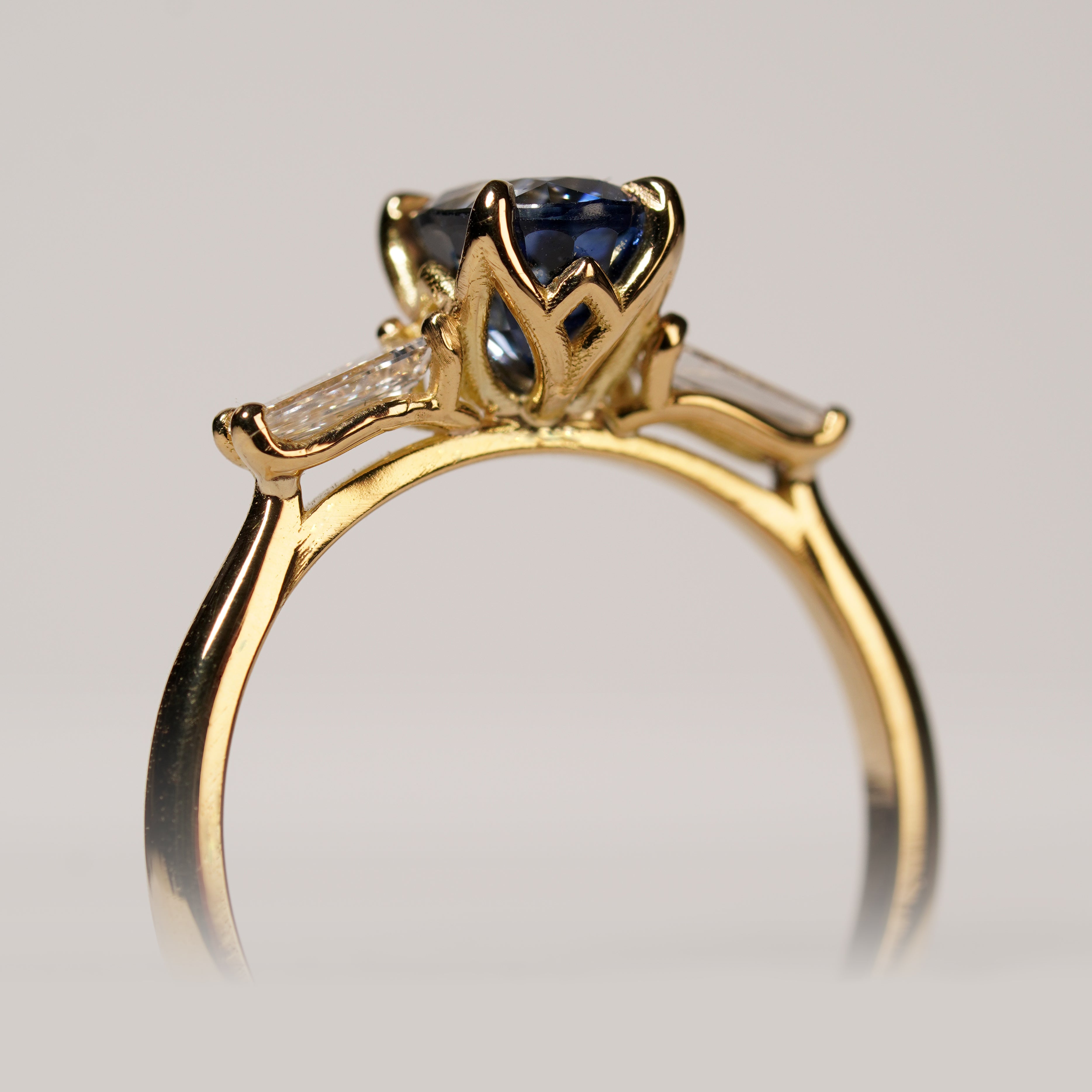 Blue sapphire and diamond engagement ring