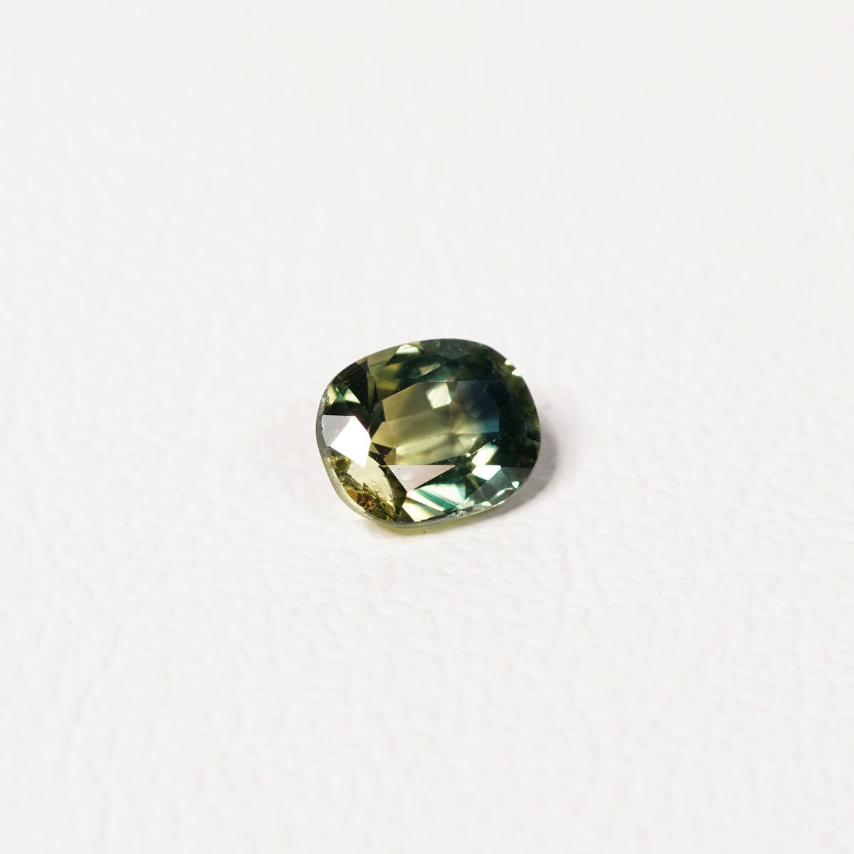 Australian Blue 1.85CT Cushion cut sapphire hand view — Ruhuna Gemstones
