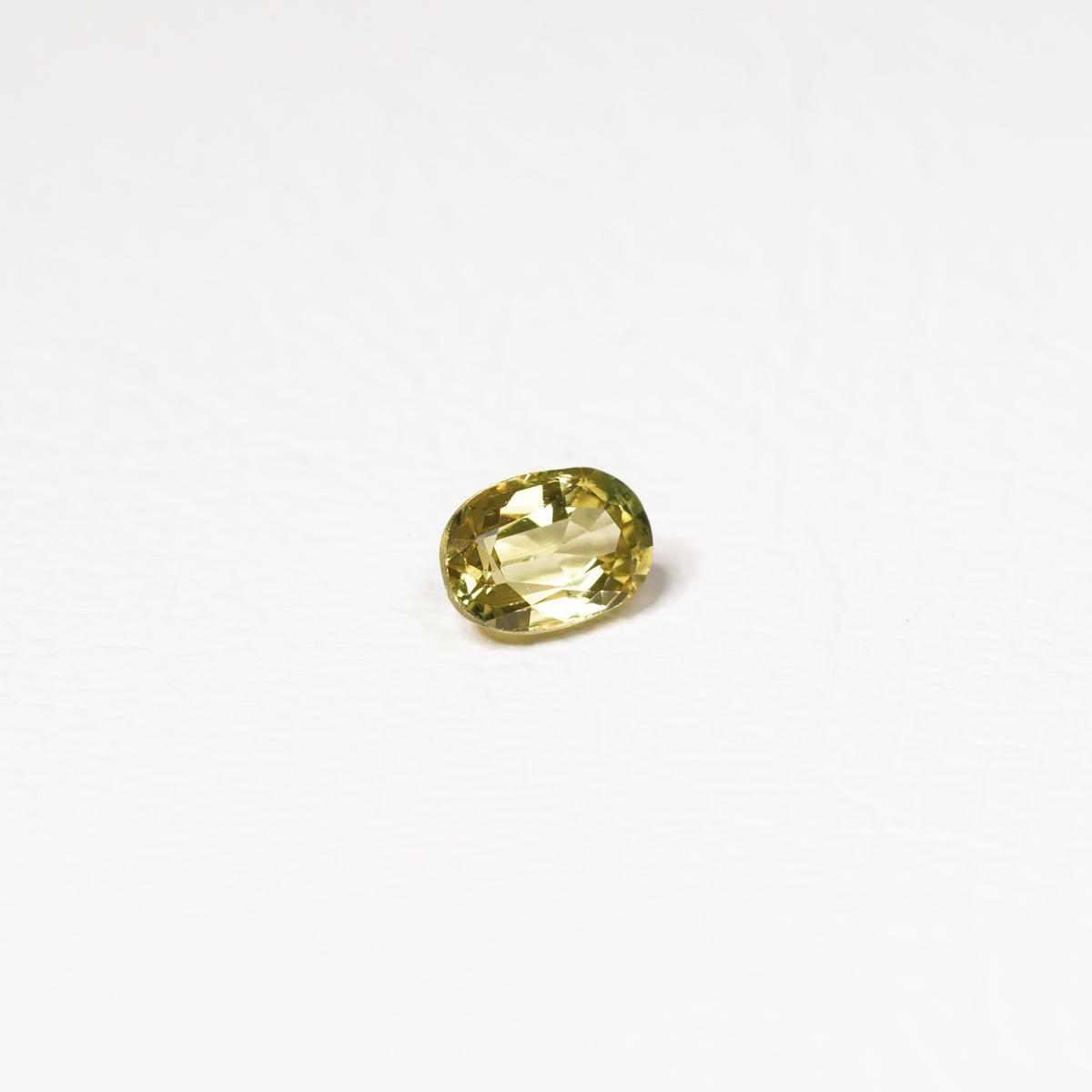 Australian 0.8CT Oval cut sapphire hand view — Ruhuna Gemstones