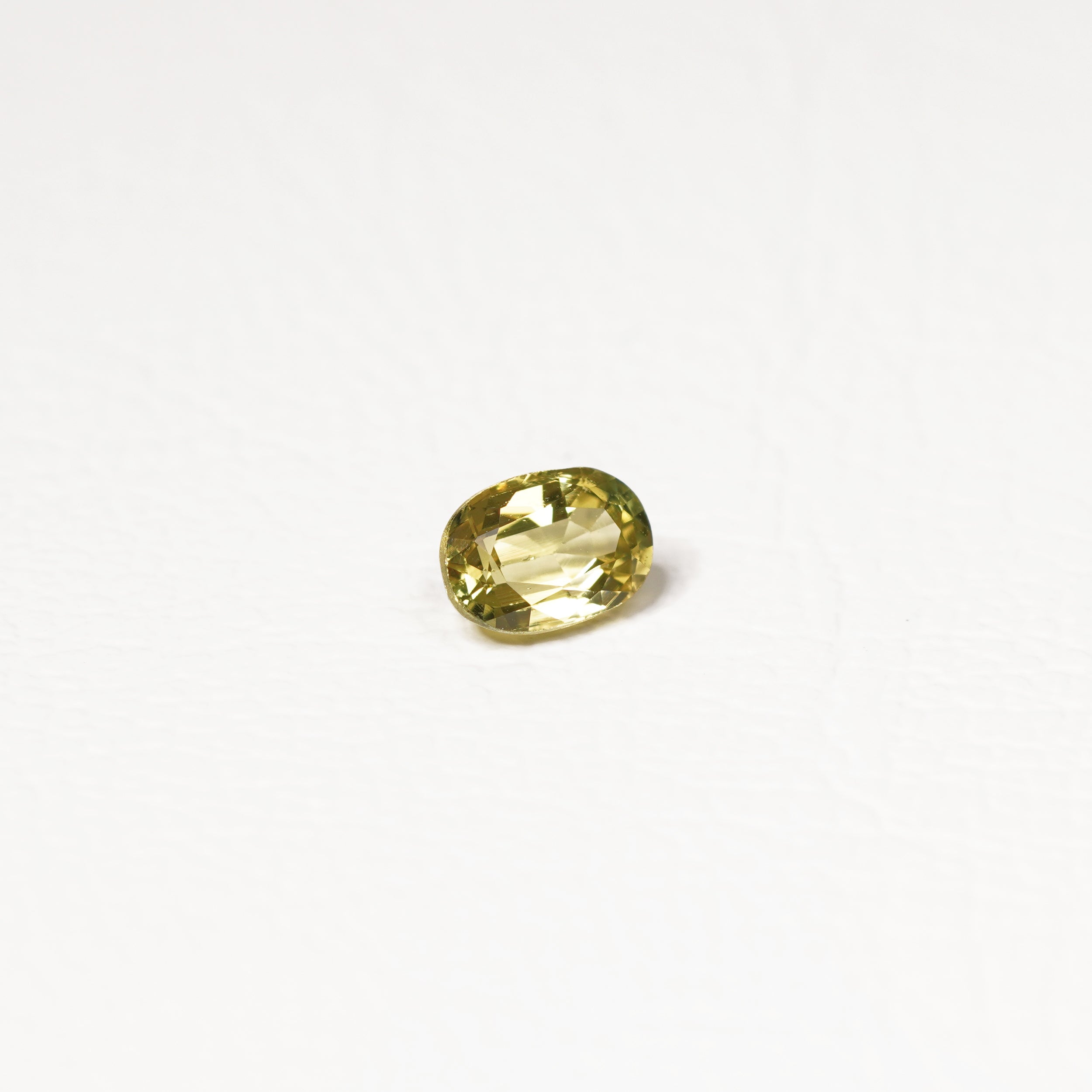 Australian 0.8CT Oval cut sapphire hand view — Ruhuna Gemstones