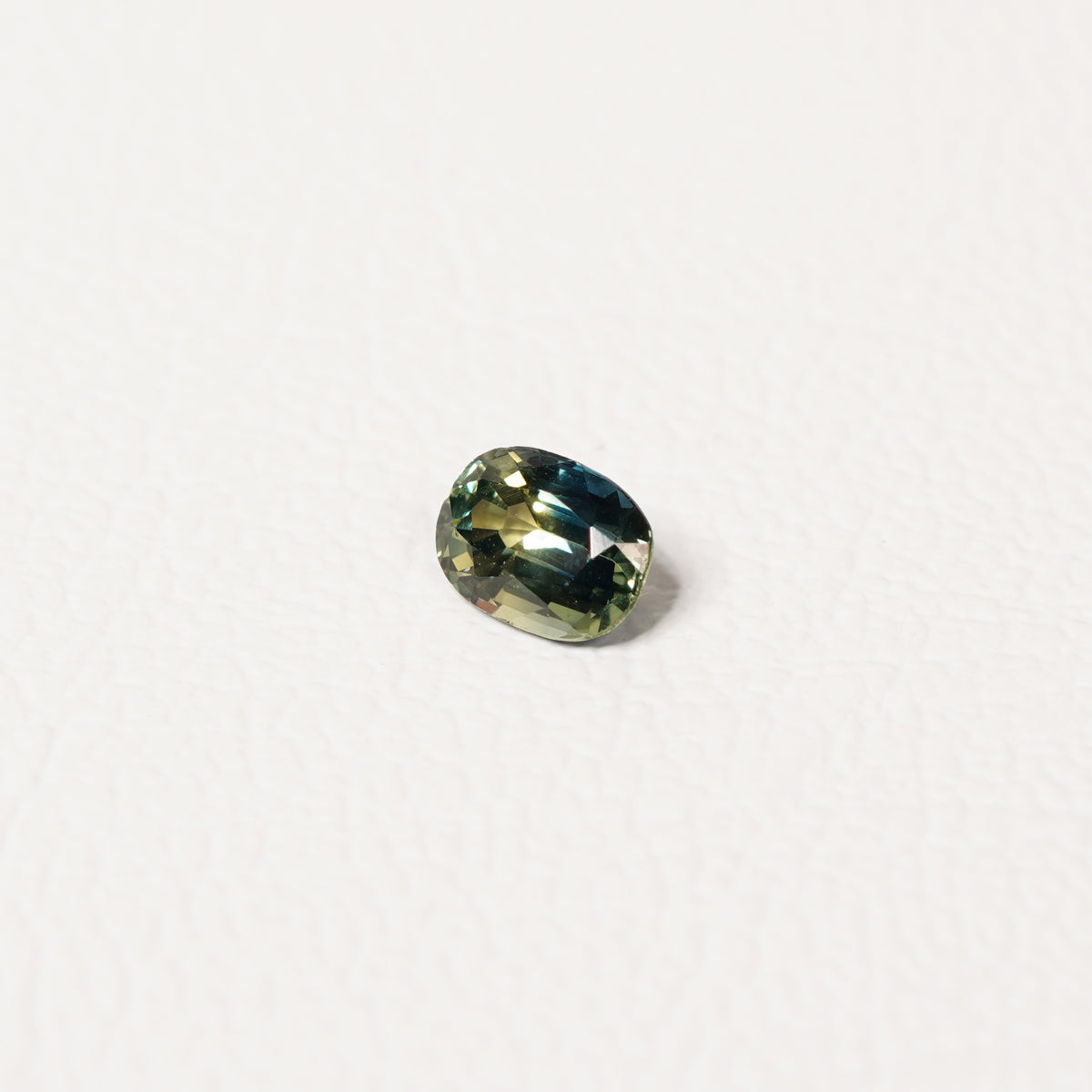 Australian Blue 0.8CT Oval cut sapphire hand view — Ruhuna Gemstones