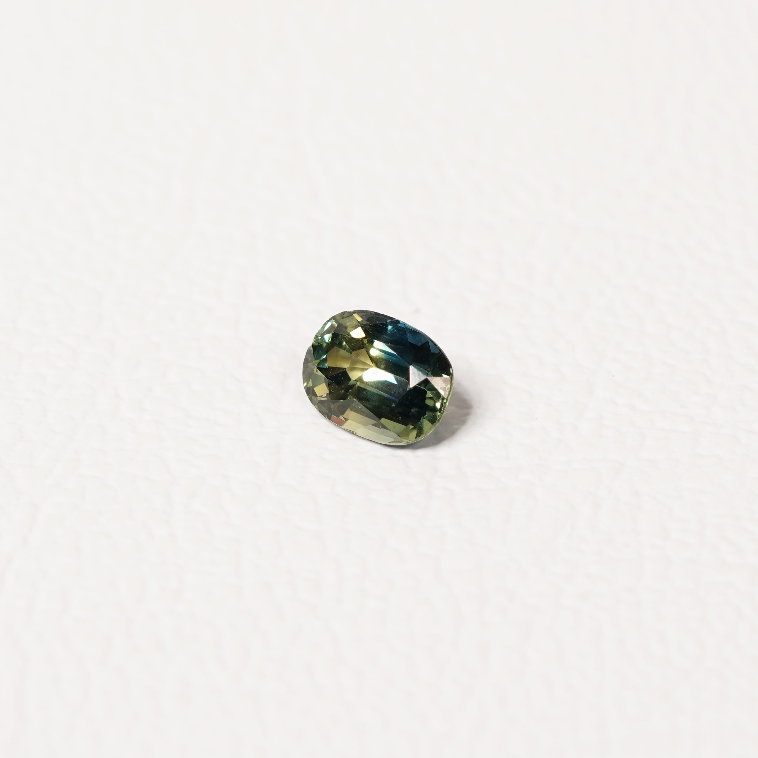 Australian Blue 0.8CT Oval cut sapphire hand view — Ruhuna Gemstones