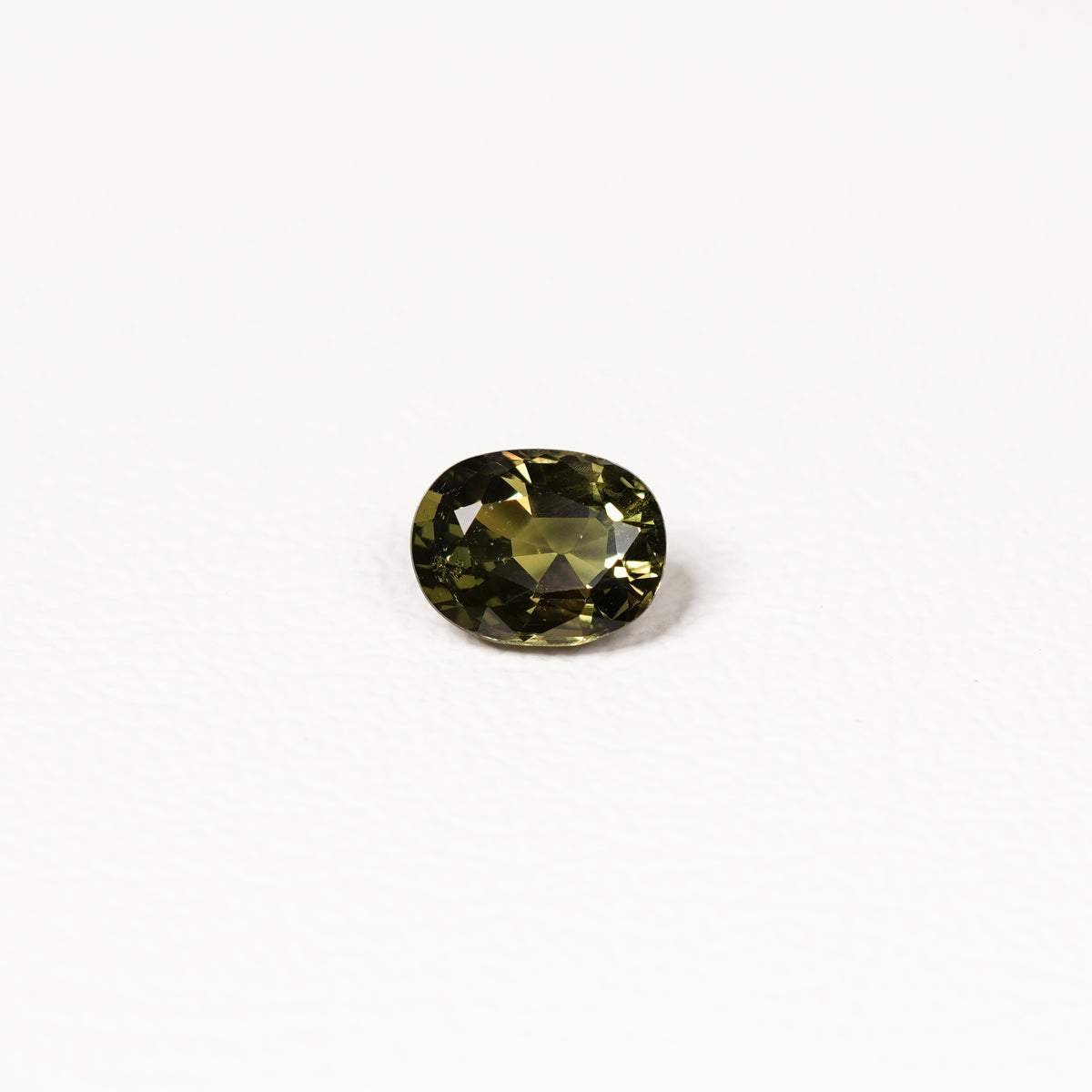 1.70ct Australian parti sapphire oval — deep olive to forest green, face-up view — Ruhuna Gemstones