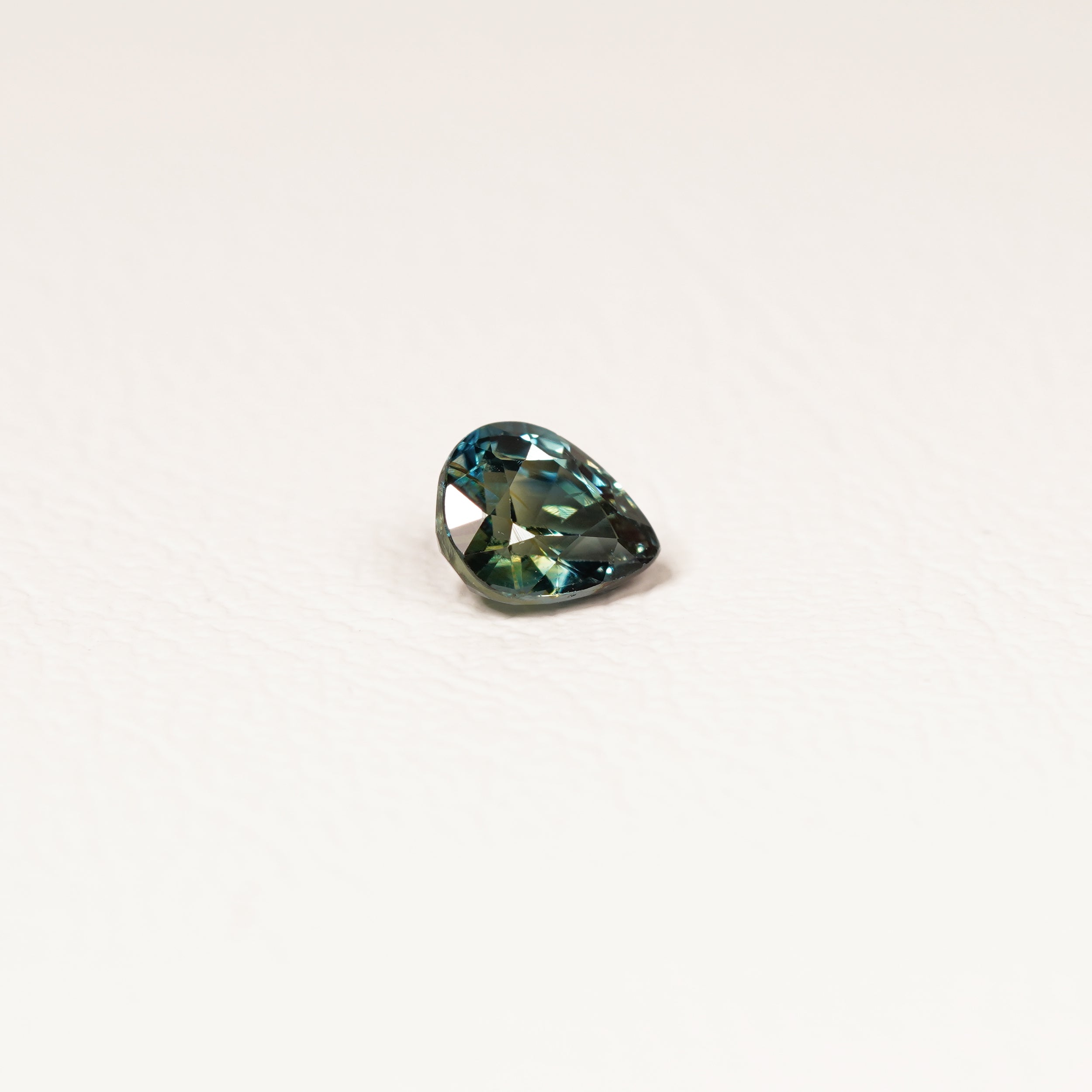Madagascar 1CT Pear cut sapphire hand view — Ruhuna Gemstones