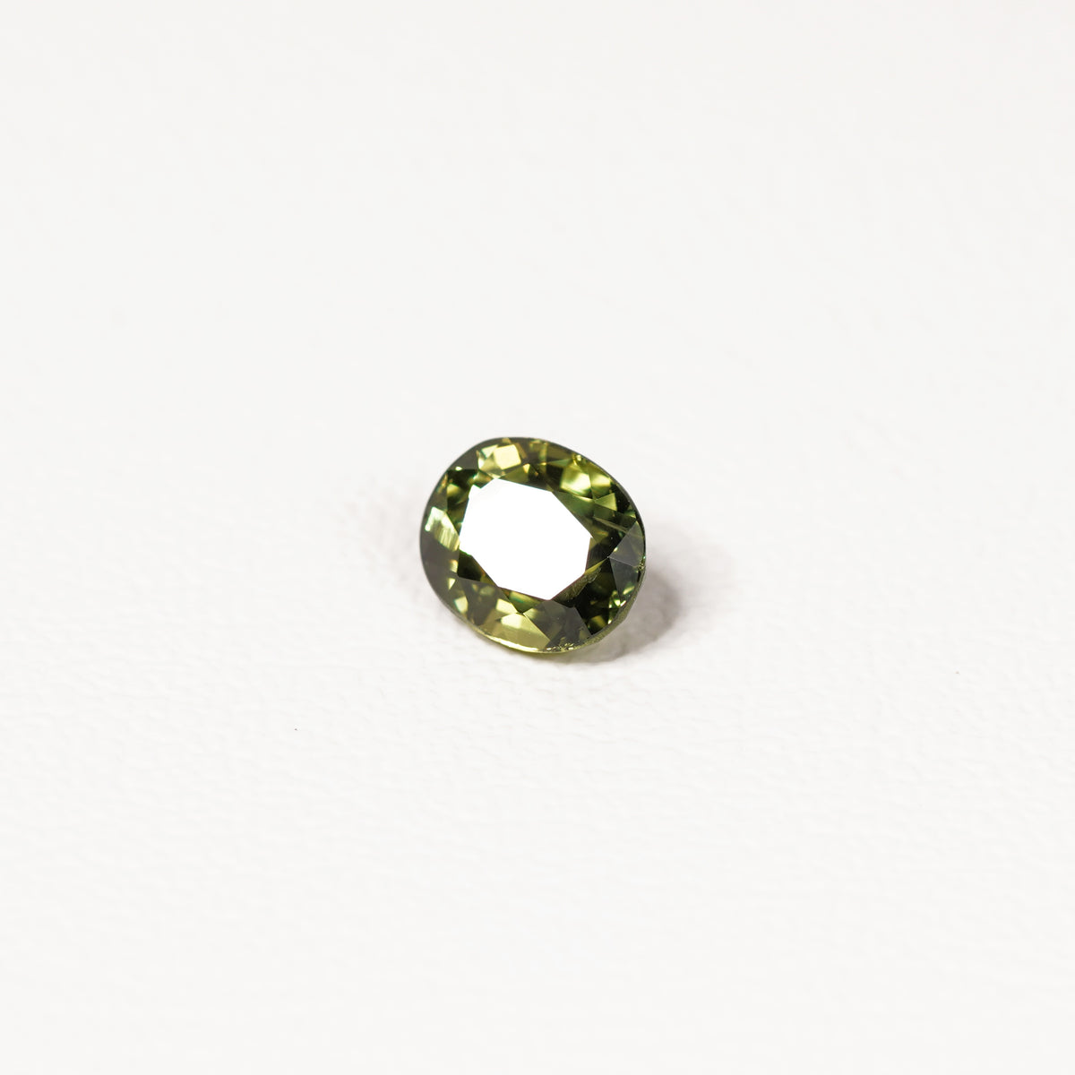 Australian green sapphire 2.10ct oval — saturated green colour zoning at angle — Ruhuna Gemstones