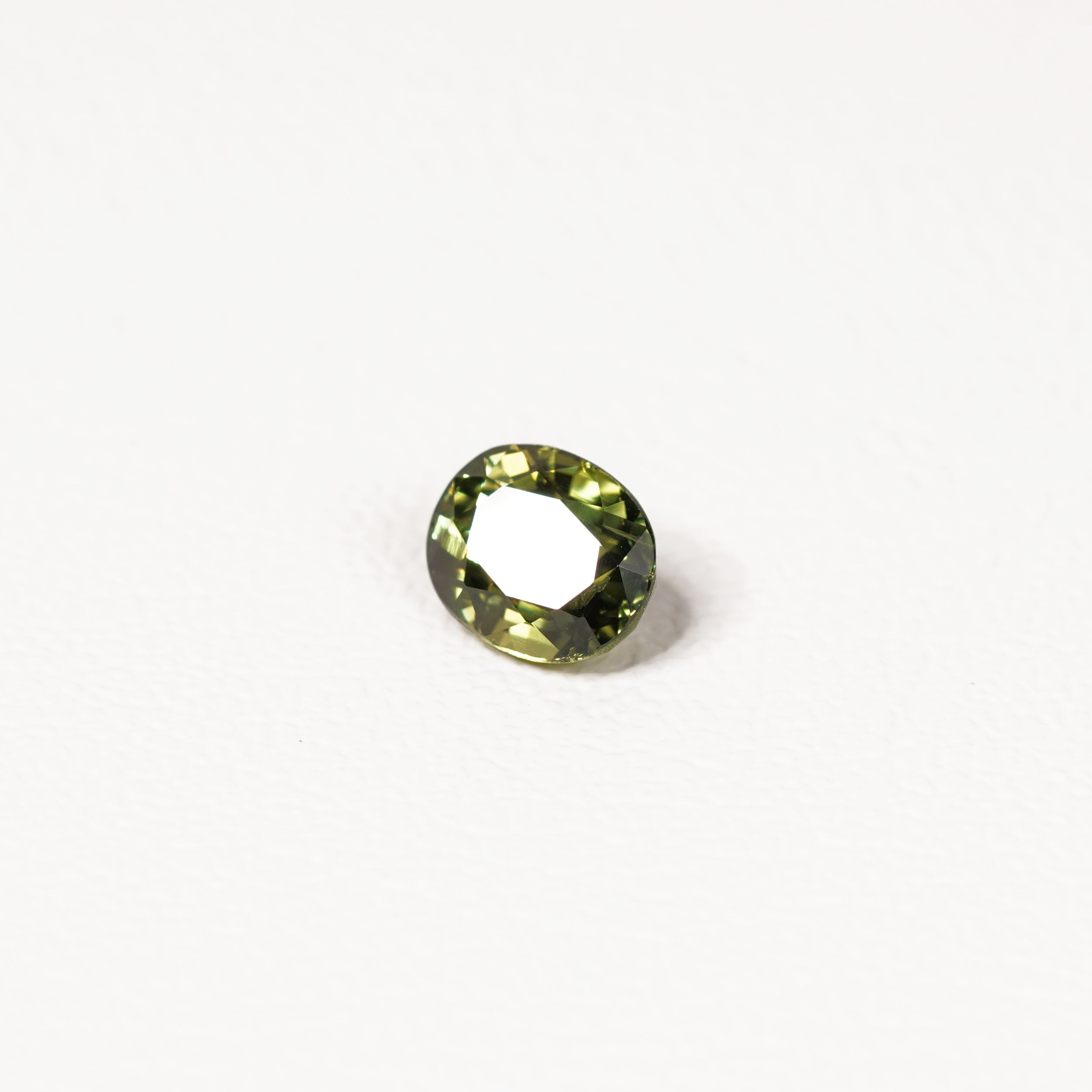 Australian green sapphire 2.10ct oval — saturated green colour zoning at angle — Ruhuna Gemstones