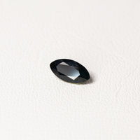 1.95ct Australian parti sapphire marquise — deep inky teal face-up with gold flash, face-up view — Ruhuna Gemstones