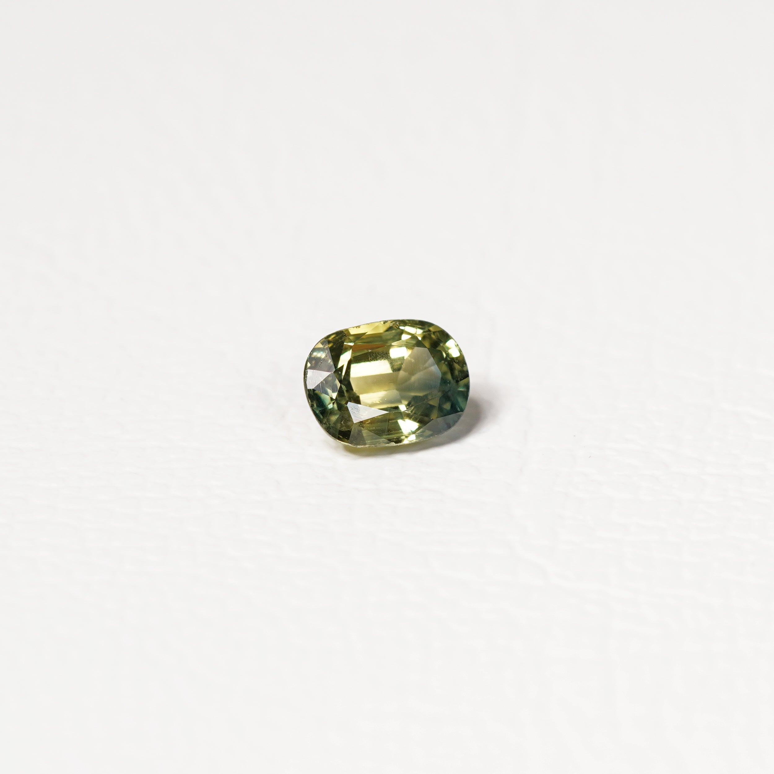 Australian Yellow 1CT Oval cut sapphire hand view — Ruhuna Gemstones