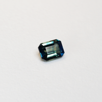 2.02 carat emerald cut teal parti sapphire with blue and green