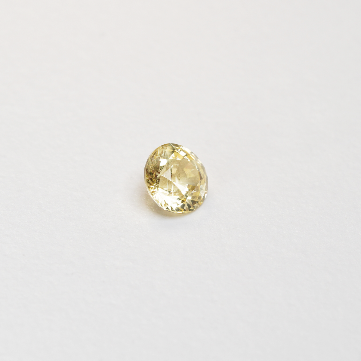 1.56 carat round cut yellow ceylon sapphire