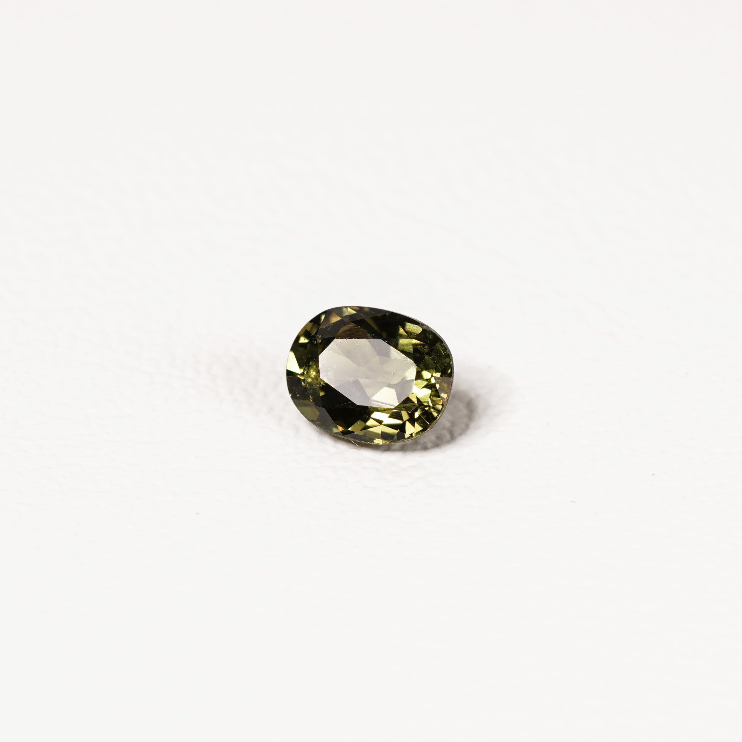 1.70ct Australian parti sapphire oval — deep olive to forest green, face-up view — Ruhuna Gemstones