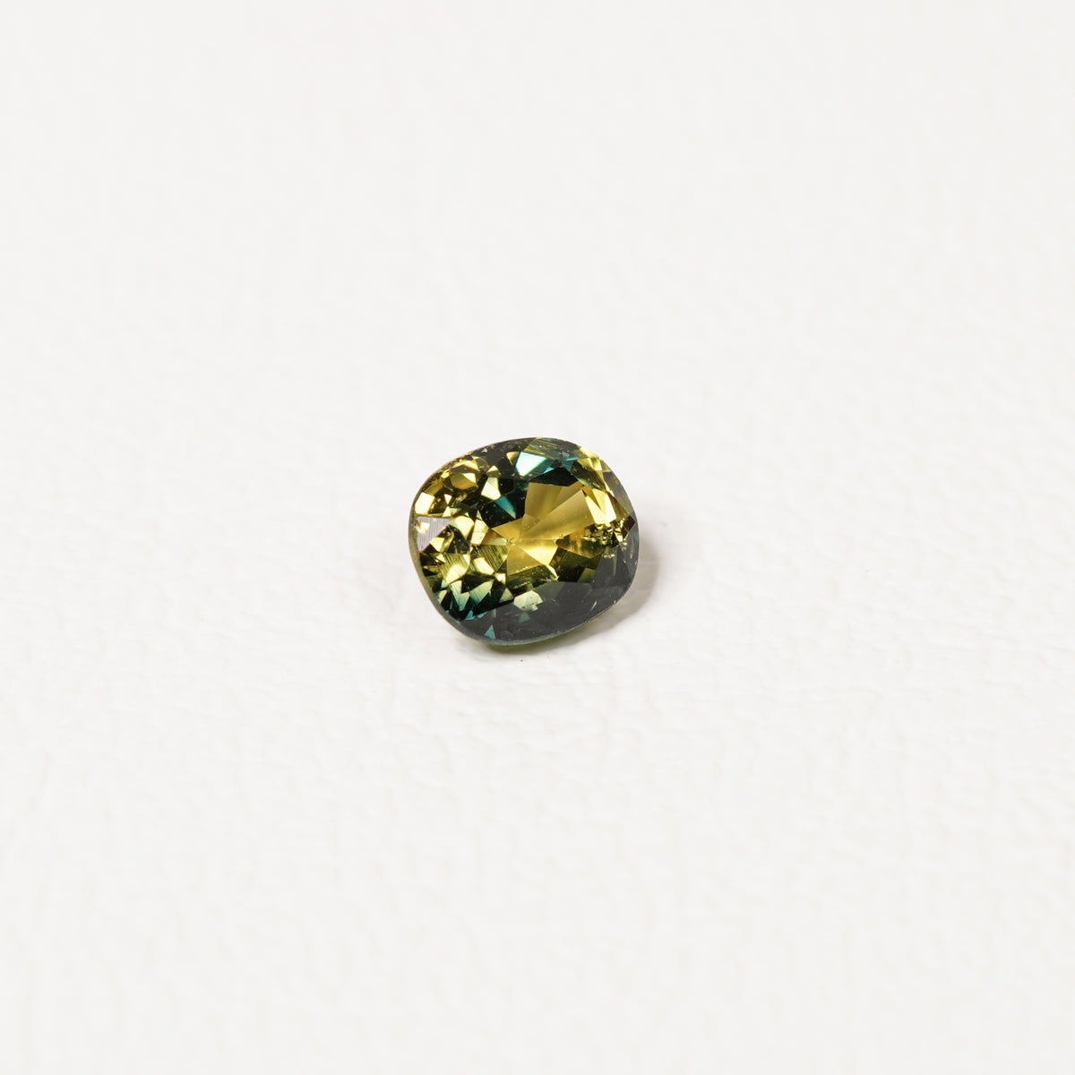 Australian Teal 1.35CT Oval cut sapphire hand view — Ruhuna Gemstones