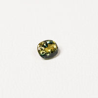 Australian Teal 1.35CT Oval cut sapphire hand view — Ruhuna Gemstones
