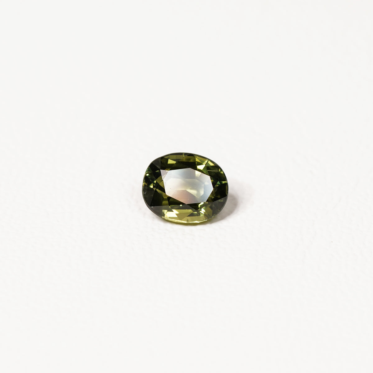 Australian green sapphire 2.10ct oval — saturated green colour zoning at angle — Ruhuna Gemstones