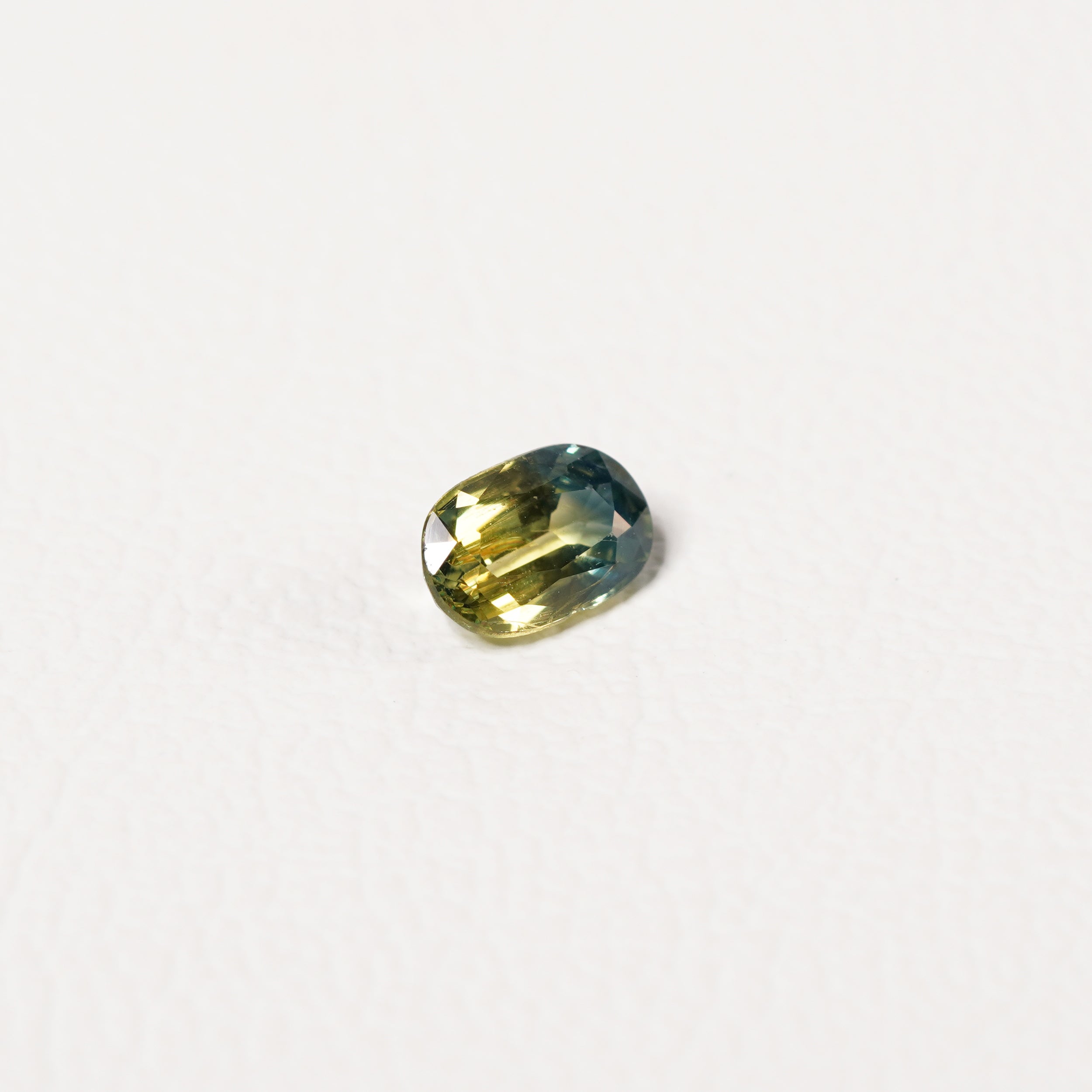 Australian Teal 0.95CT Cushion cut sapphire close-up detail — Ruhuna Gemstones