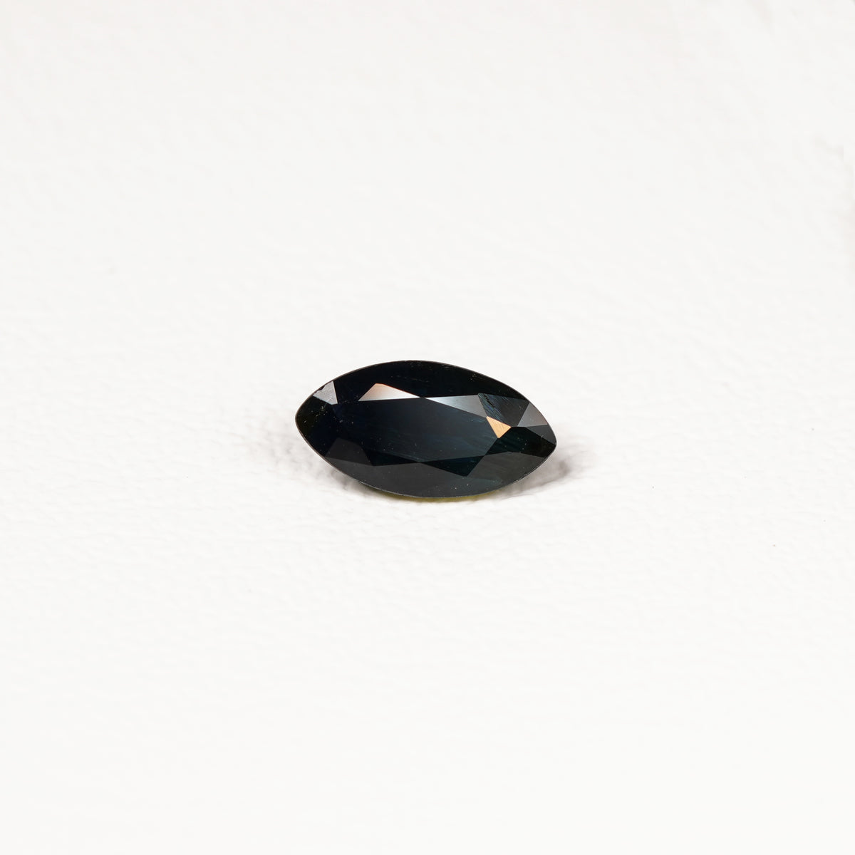 1.95ct Australian parti sapphire marquise — deep inky teal face-up with gold flash, face-up view — Ruhuna Gemstones