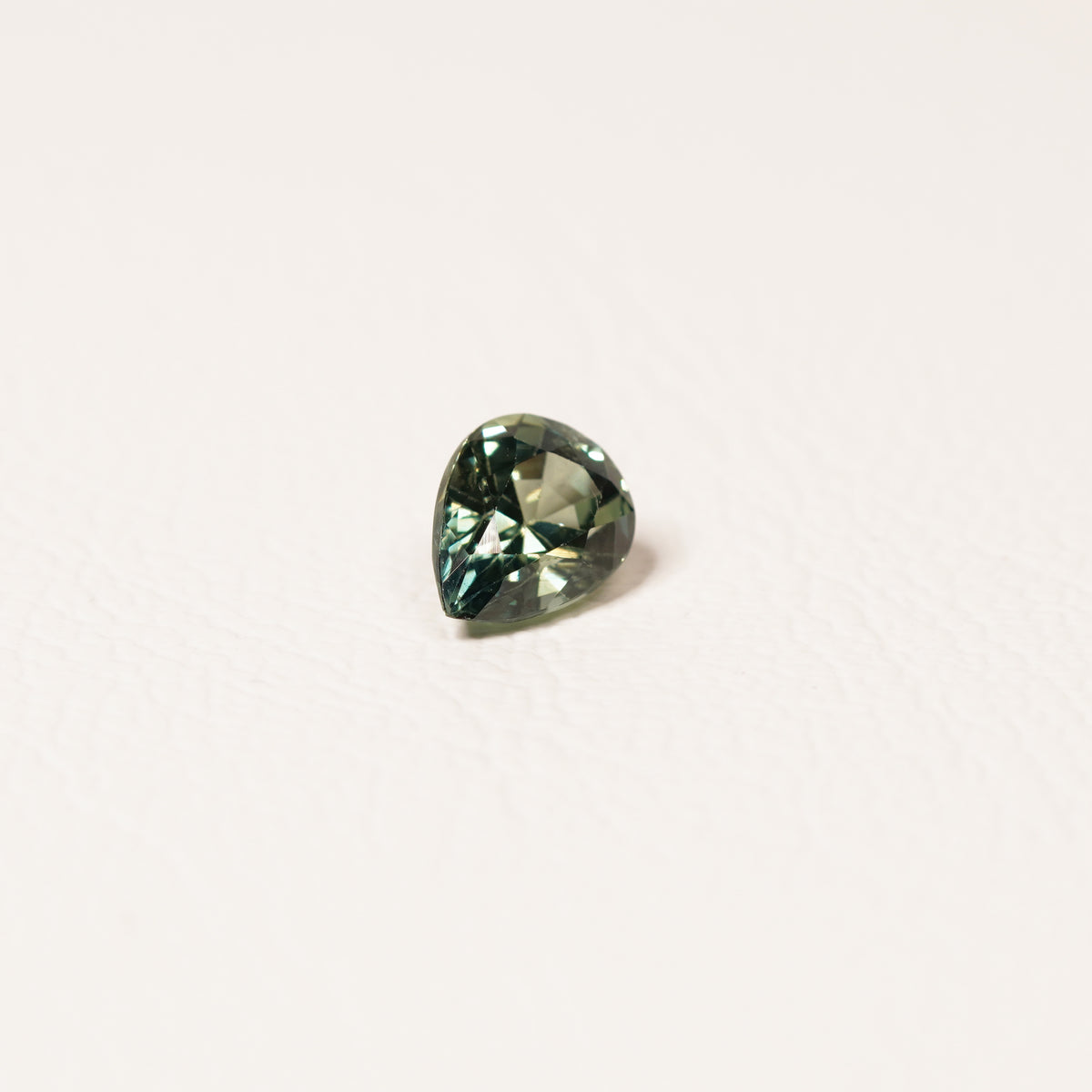 Madagascar 1.25CT Pear cut sapphire hand view — Ruhuna Gemstones
