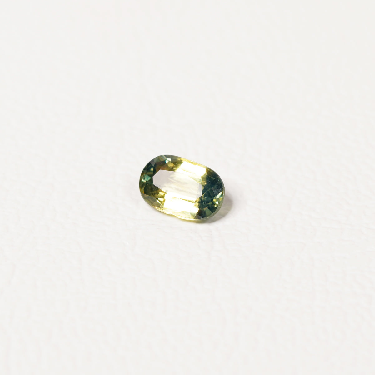 Australian Teal 0.95CT Cushion cut sapphire top-down view — Ruhuna Gemstones