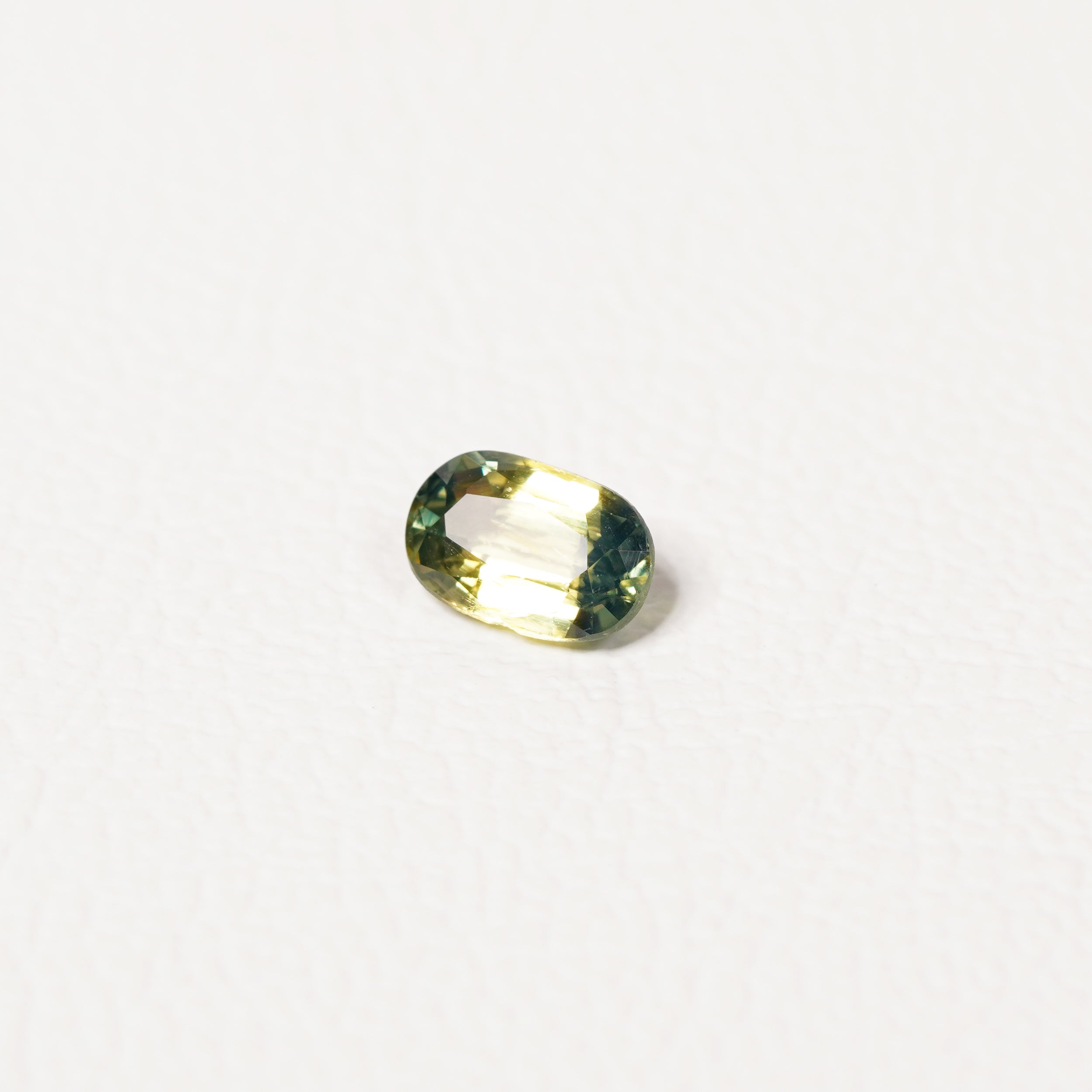 Australian Teal 0.95CT Cushion cut sapphire top-down view — Ruhuna Gemstones