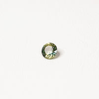 0.90ct Australian parti sapphire round — bright yellow-green body with teal crown accent, face-up — Ruhuna Gemstones