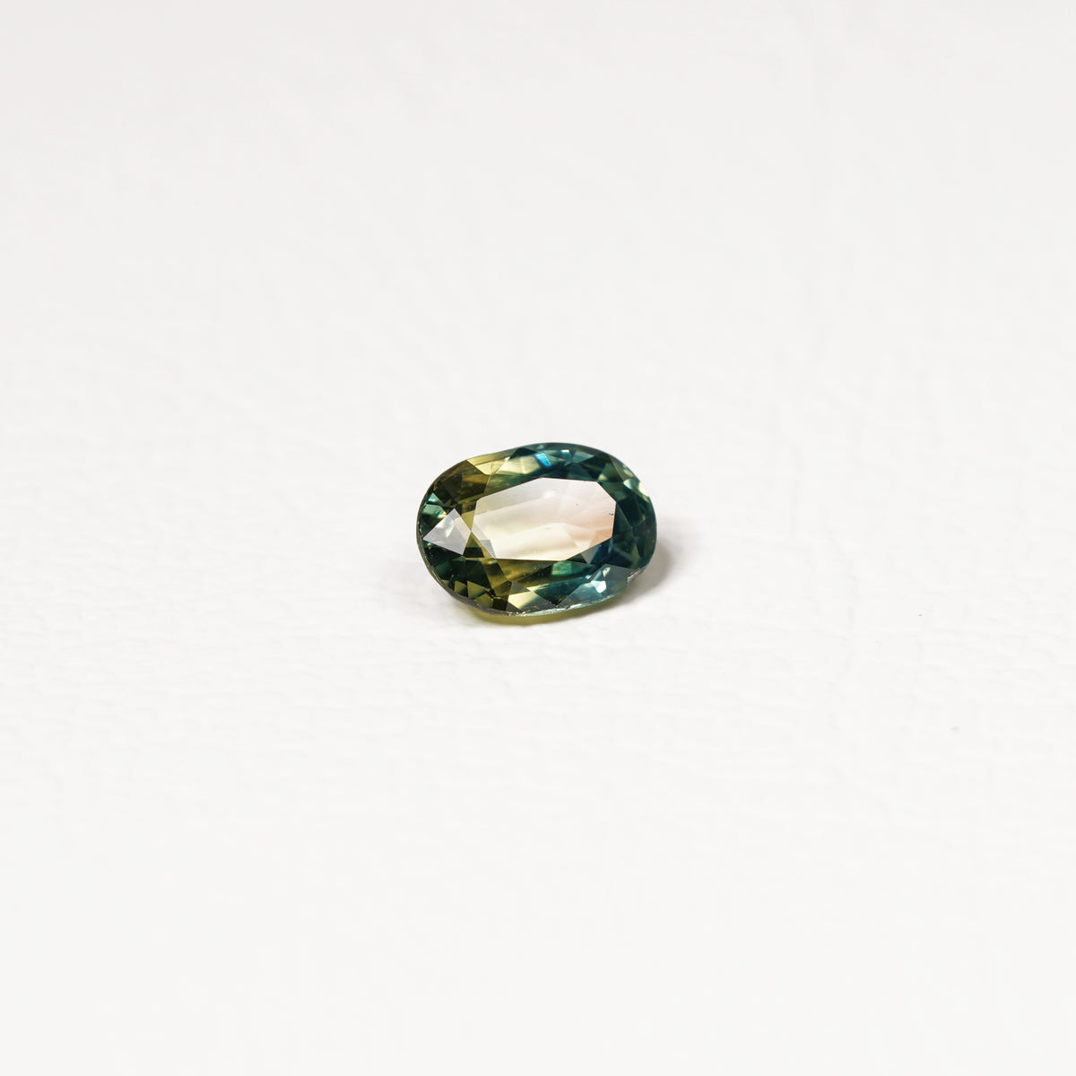 Australian Teal 1CT Oval cut sapphire hand view — Ruhuna Gemstones