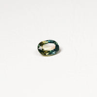 Australian Teal 1CT Oval cut sapphire hand view — Ruhuna Gemstones